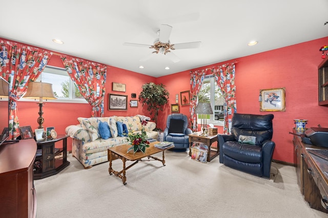 carpeted living room featuring a ceiling fan, plenty of natural light, and recessed lighting