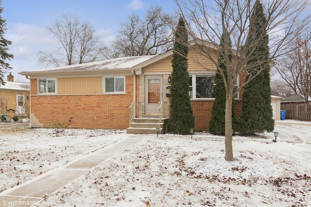 view of front of home featuring brick siding