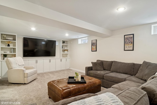 living area featuring carpet flooring, recessed lighting, baseboards, and built in shelves