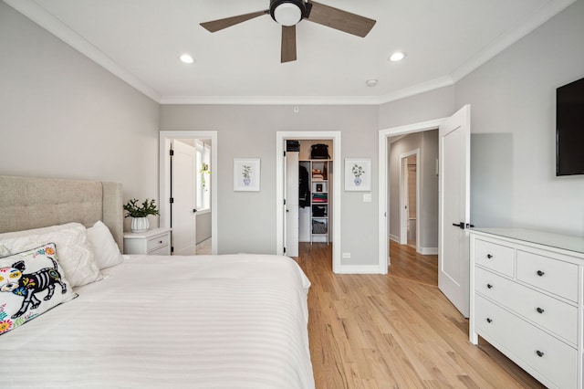 7230 W Belden Ave Unit 3, Elmwood Park, IL 60707 - bedroom with light wood finished floors, crown molding, a spacious closet, recessed lighting, and baseboards