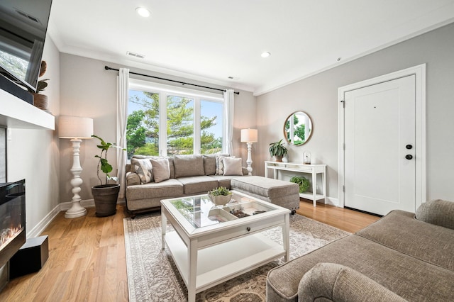 7230 W Belden Ave Unit 3, Elmwood Park, IL 60707 - living area with light wood-type flooring, baseboards, ornamental molding, and recessed lighting