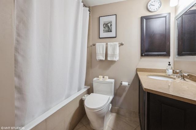 bathroom featuring tile patterned flooring, shower / bath combo with shower curtain, toilet, and vanity