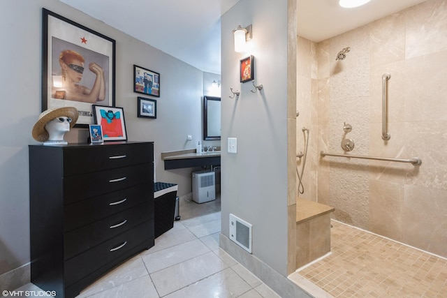 bathroom featuring visible vents, a walk in shower, and tile patterned flooring