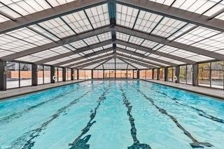view of pool with a covered structure