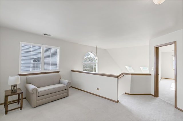1100 E Cambria Ln, Lombard, IL 60148 - living area featuring carpet, baseboards, and an upstairs landing