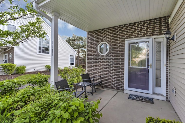 1100 E Cambria Ln, Lombard, IL 60148 - doorway to property with brick siding and a patio area