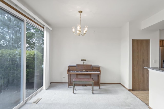 1100 E Cambria Ln, Lombard, IL 60148 - living area with a chandelier, light carpet, and baseboards