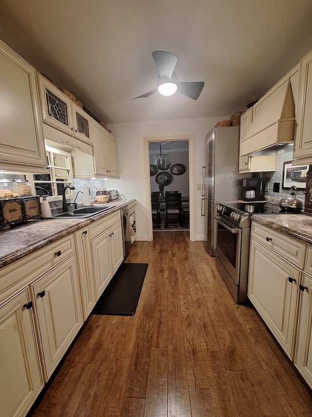 7323 Heritage Ct Unit 1D, Frankfort, IL 60423 - kitchen with electric range, premium range hood, a sink, backsplash, and a ceiling fan