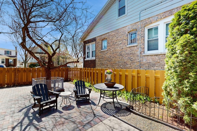 5650 W Grace St, Chicago, IL 60634 - view of patio / terrace with fence and outdoor dining space