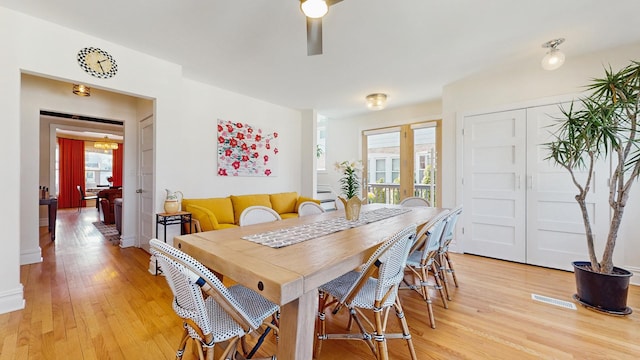 5650 W Grace St, Chicago, IL 60634 - dining room with light wood finished floors and visible vents