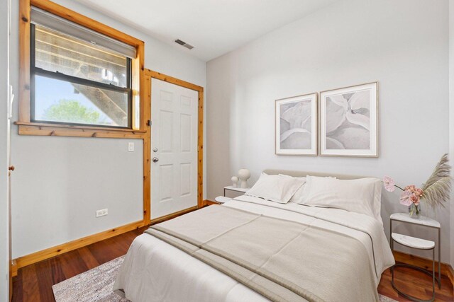1247 W Roscoe St Unit 2, Chicago, IL 60657 - bedroom featuring wood finished floors and baseboards