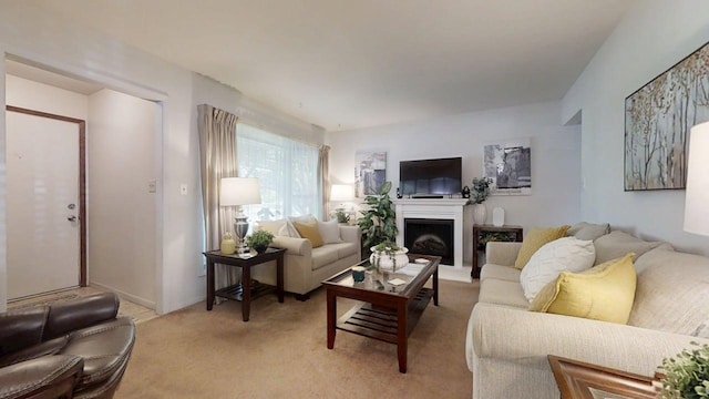1309 Eureka St, Urbana, IL 61801 - living room with light colored carpet and a fireplace with raised hearth