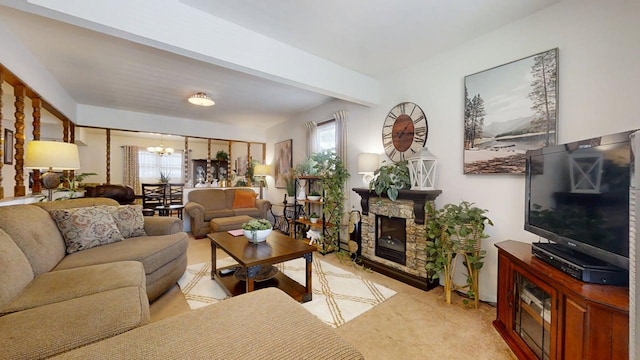 1309 Eureka St, Urbana, IL 61801 - living room featuring a chandelier and a fireplace