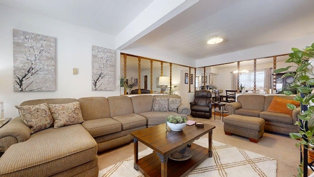 1309 Eureka St, Urbana, IL 61801 - living area featuring a chandelier and light colored carpet