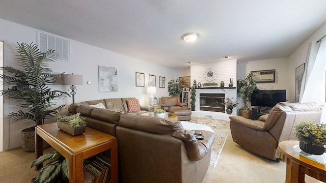 1309 Eureka St, Urbana, IL 61801 - living area with light colored carpet, a wall mounted AC, and a fireplace