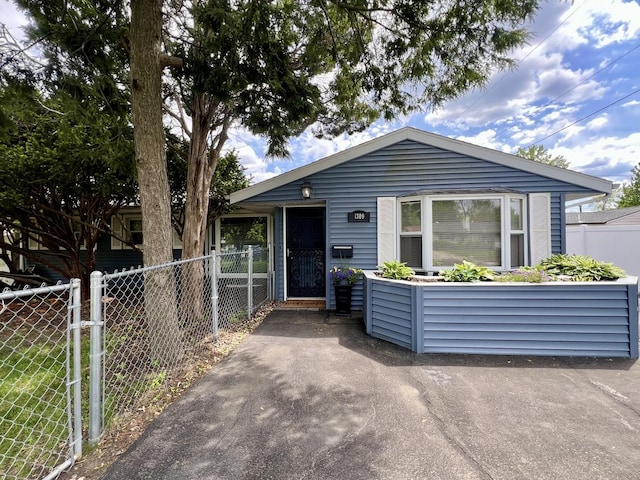 1309 Eureka St, Urbana, IL 61801 - view of front facade with fence and a gate