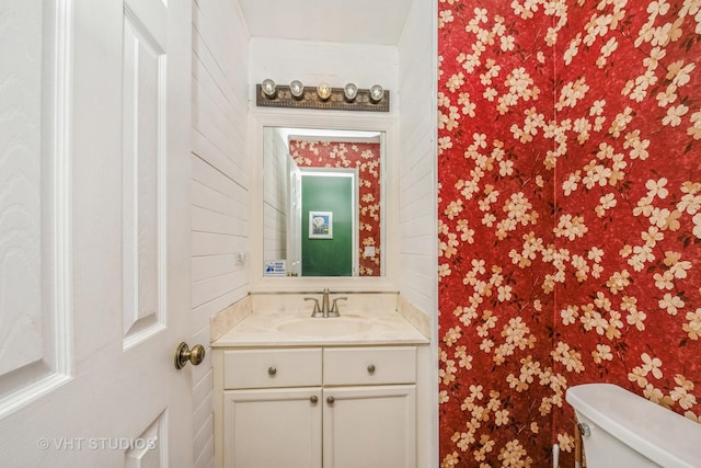 half bath with toilet and vanity
