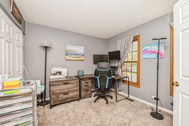office area featuring carpet and baseboards