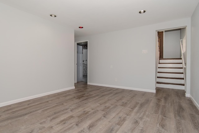 15413 Dobson Ave, Dolton, IL 60419 - empty room featuring stairway, baseboards, and wood finished floors