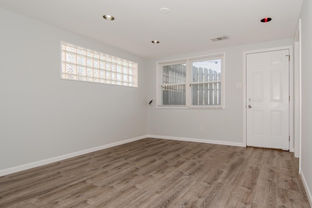 15413 Dobson Ave, Dolton, IL 60419 - spare room featuring recessed lighting, baseboards, visible vents, and wood finished floors