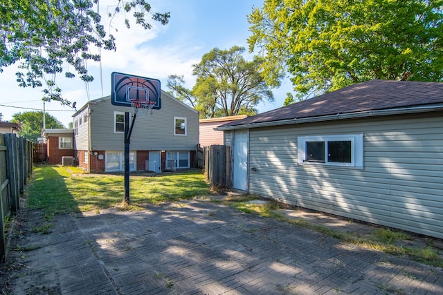 15413 Dobson Ave, Dolton, IL 60419 - rear view of house with a yard, a patio, cooling unit, and a fenced backyard
