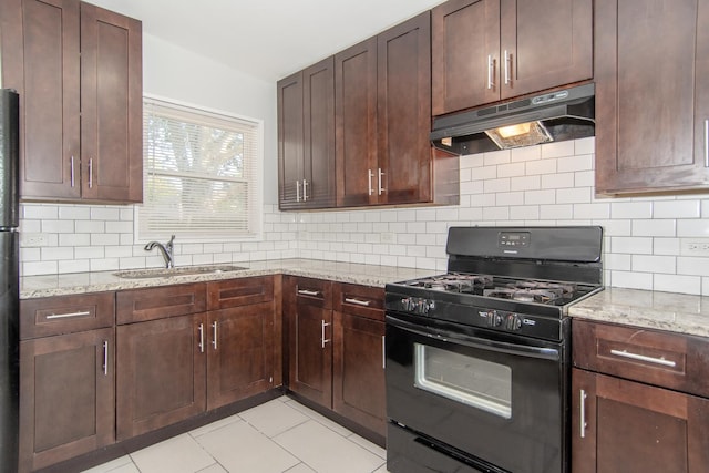 15413 Dobson Ave, Dolton, IL 60419 - kitchen featuring backsplash, light stone countertops, a sink, black range with gas stovetop, and under cabinet range hood