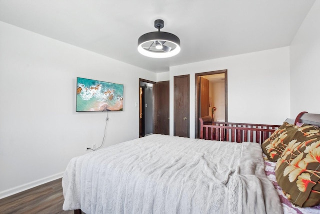 7310 Tiffany Dr Unit 2B, Orland Park, IL 60462 - bedroom featuring baseboards and dark wood-type flooring