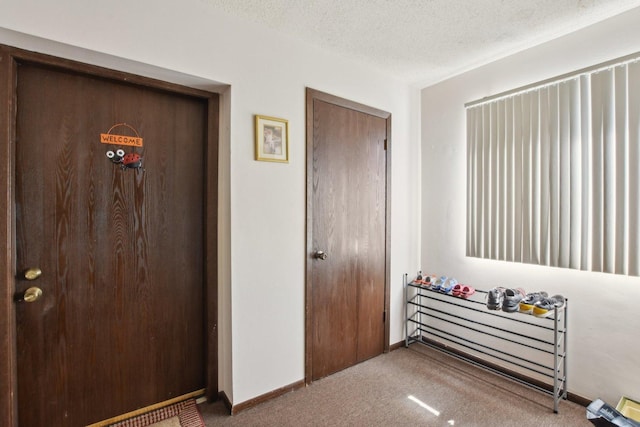 7310 Tiffany Dr Unit 2B, Orland Park, IL 60462 - carpeted bedroom with a textured ceiling and baseboards
