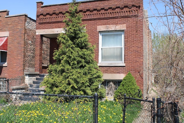 view of property with fence