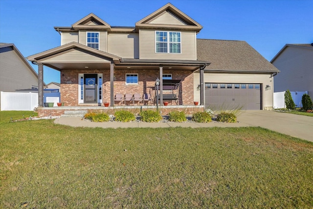 craftsman-style home featuring covered porch, an attached garage, concrete driveway, a front yard, and brick siding