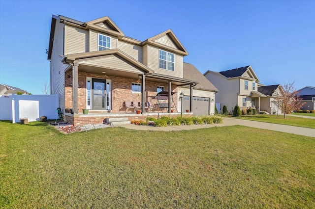 craftsman house with covered porch, concrete driveway, brick siding, and a front yard
