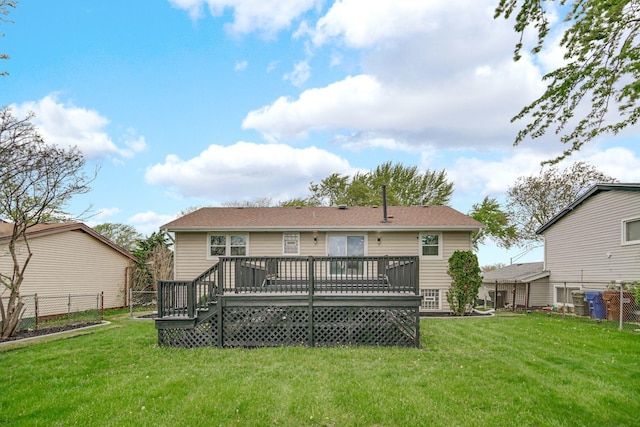 back of house featuring a deck