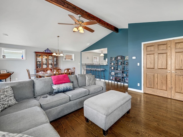 11321 S Drake Ave, Chicago, IL 60655 - living room with baseboards, vaulted ceiling with beams, ceiling fan with notable chandelier, and wood finished floors
