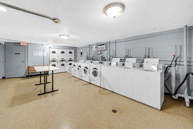 8901 N Western Ave Unit 116, Des Plaines, IL 60016 - shared laundry area featuring washing machine and clothes dryer and stacked washer / dryer