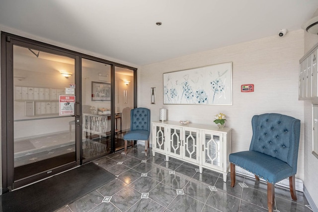 living area featuring tile patterned floors