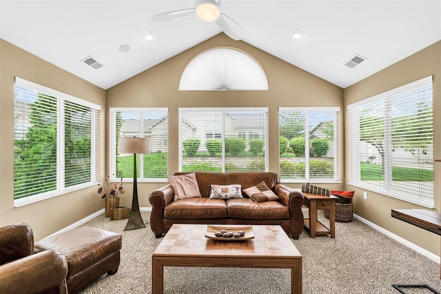2715 J T Coffman Dr Unit 2715, Champaign, IL 61822 - living room featuring light colored carpet, ceiling fan, healthy amount of natural light, and vaulted ceiling