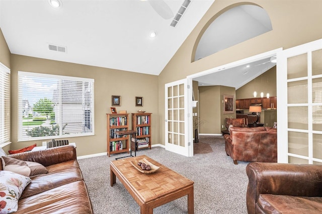 2715 J T Coffman Dr Unit 2715, Champaign, IL 61822 - carpeted living room with french doors, vaulted ceiling, recessed lighting, and baseboards