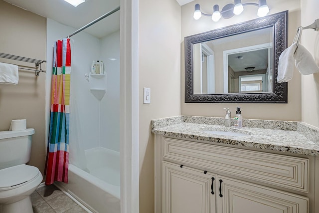 bathroom featuring vanity, shower / tub combo, tile patterned floors, and toilet