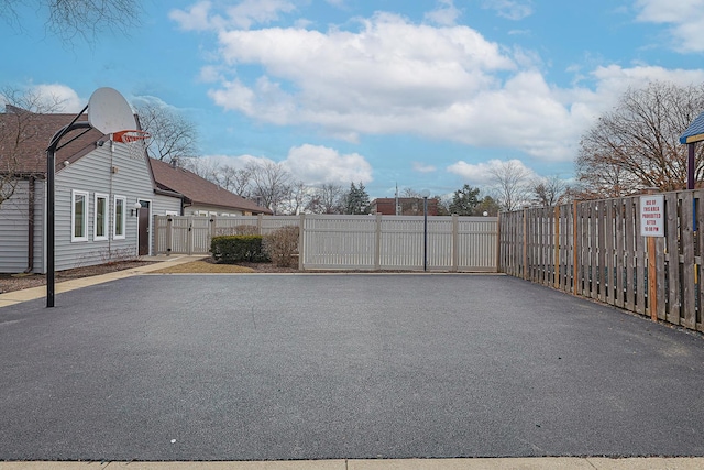 exterior space featuring a gate