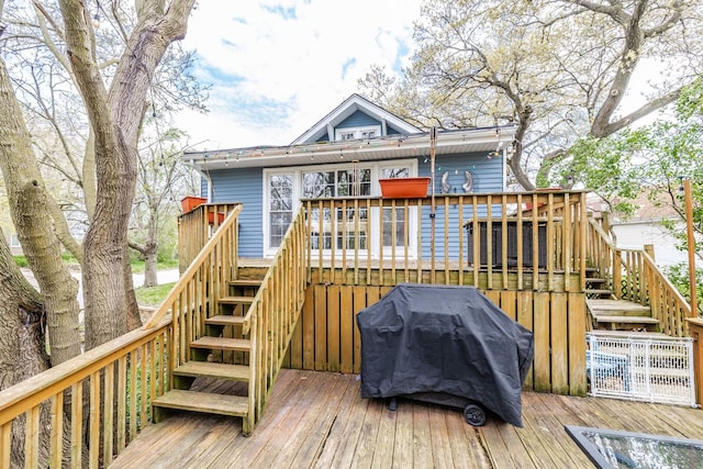 back of house with stairs and a wooden deck