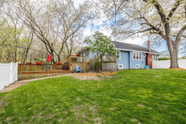 view of yard featuring a wooden deck