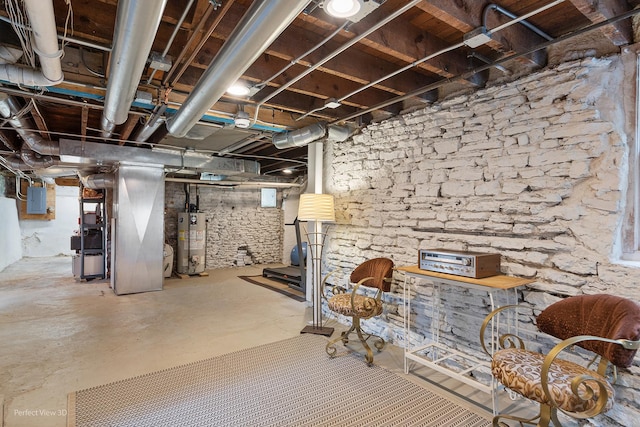 unfinished basement featuring water heater and electric panel