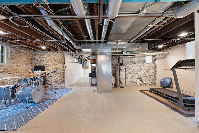 below grade area featuring heating unit and water heater