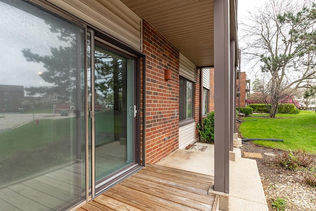 wooden deck with a yard