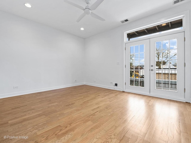unfurnished room featuring light wood-style floors, french doors, baseboards, recessed lighting, and ceiling fan
