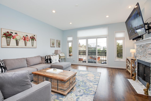 937 N Willard Ct Unit 1, Chicago, IL 60642 - living room with a fireplace, recessed lighting, wood finished floors, and baseboards