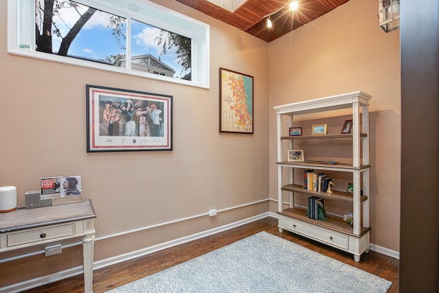 937 N Willard Ct Unit 1, Chicago, IL 60642 - living area with dark wood-type flooring, baseboards, and wood ceiling