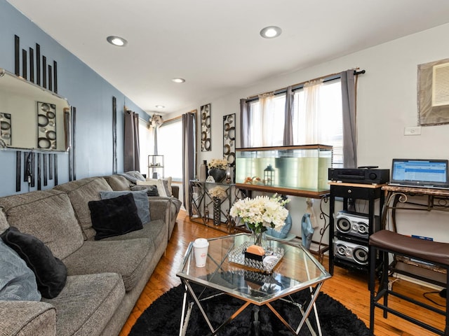 2720 E 76th Pl, Chicago, IL 60649 - living room with wood finished floors and recessed lighting