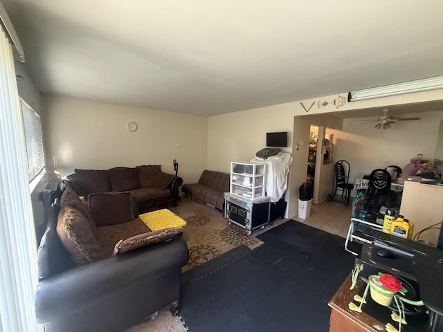 living area with a ceiling fan