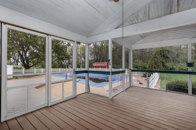 sunroom with beamed ceiling